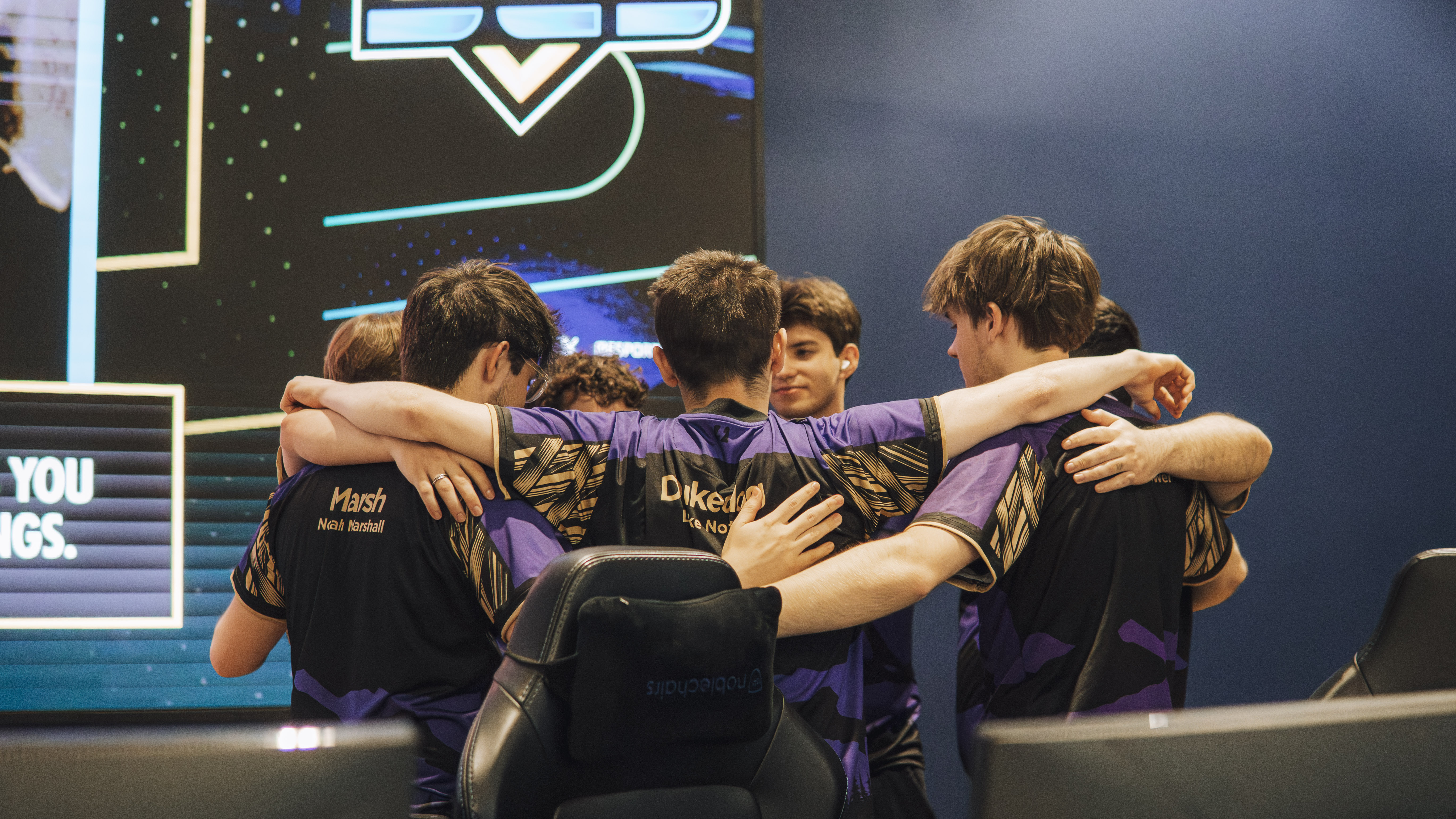 NEL team in a pre-match huddle at a championship event